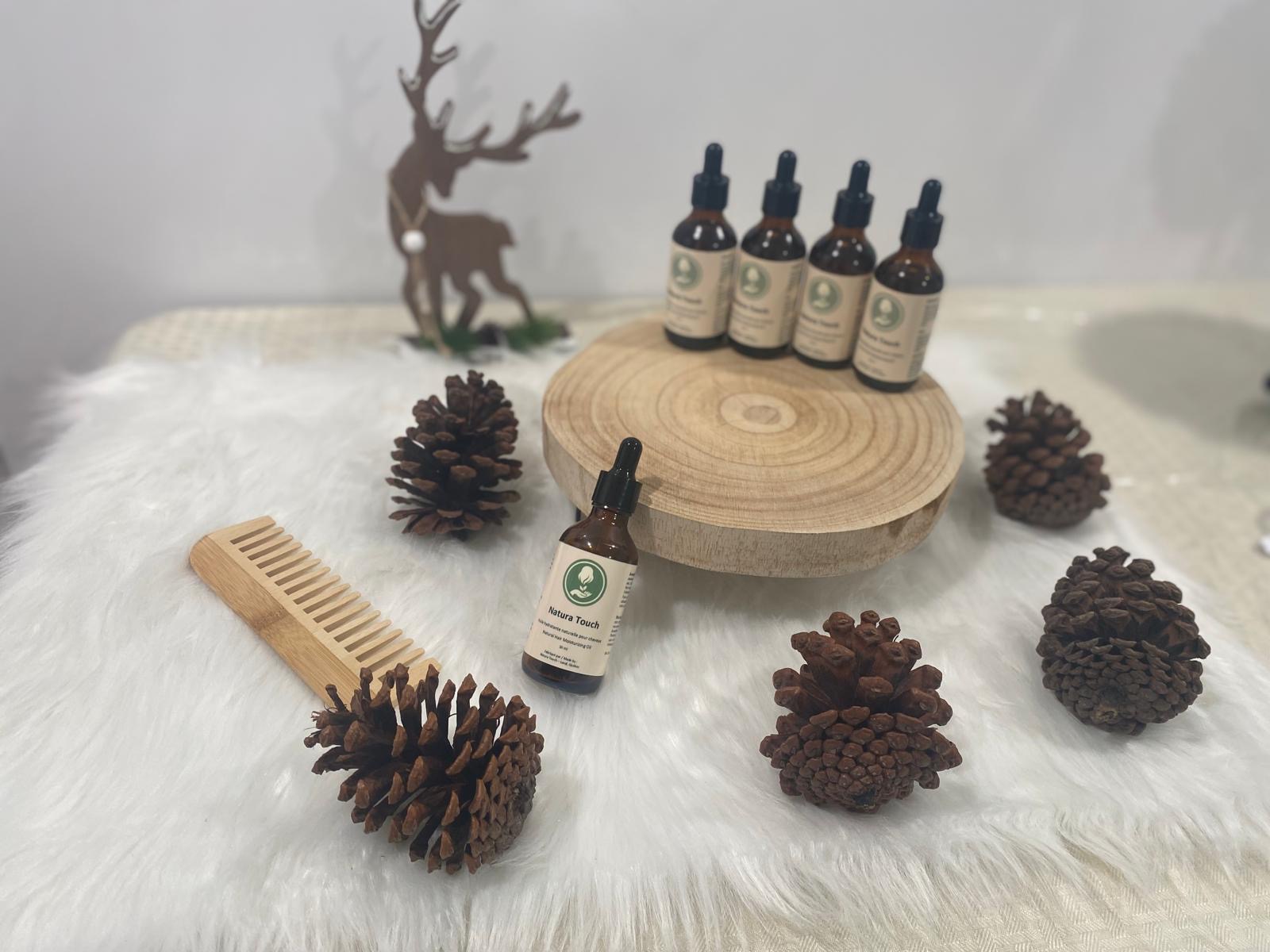 Natura Touch Hair Oil 50ml bottle for stimulating baby hair growth in adults